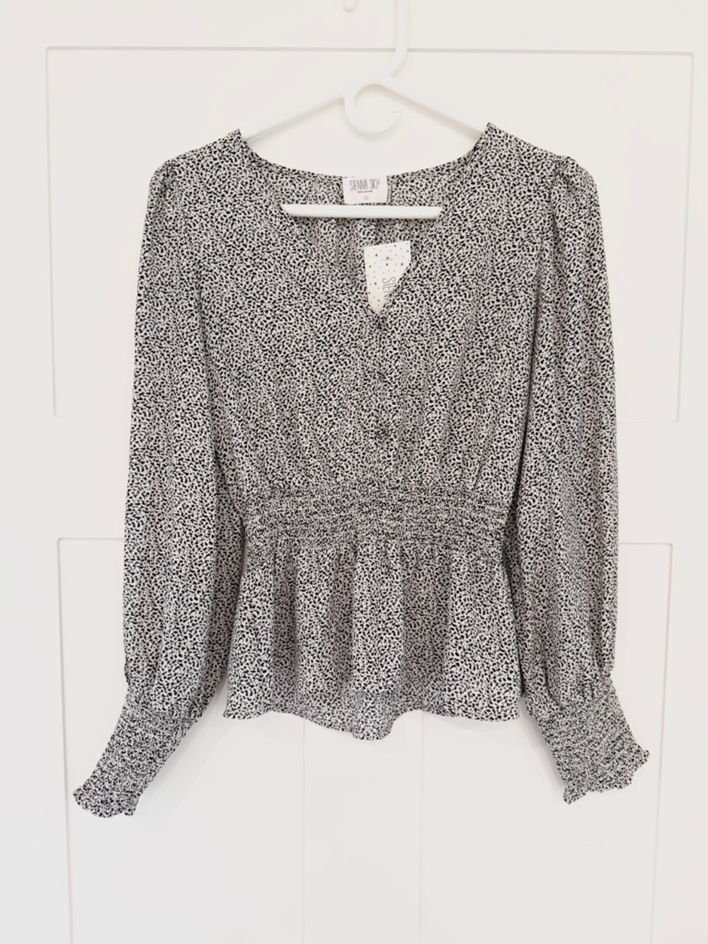 Sienna Sky Black and White Printed V-Neck Smocked Peplum Blouse